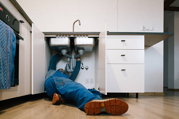 Professional Drain Cleaning technician working in Saint Georges, DE
